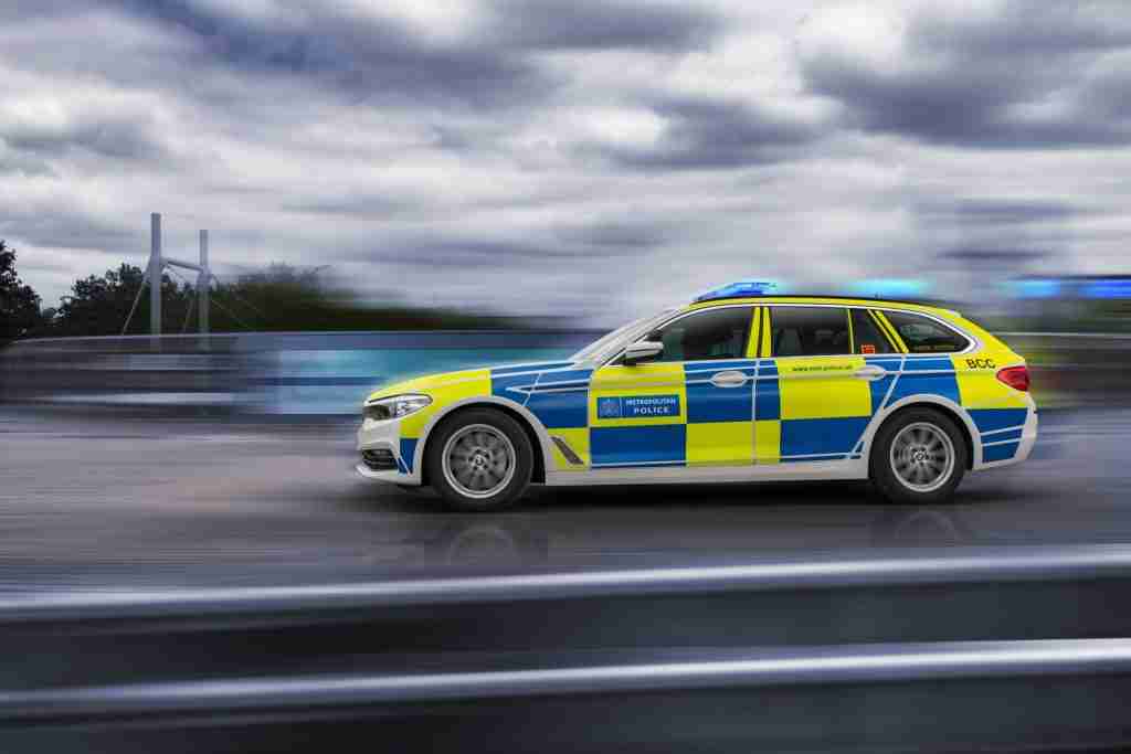 Met Police car driving at speed