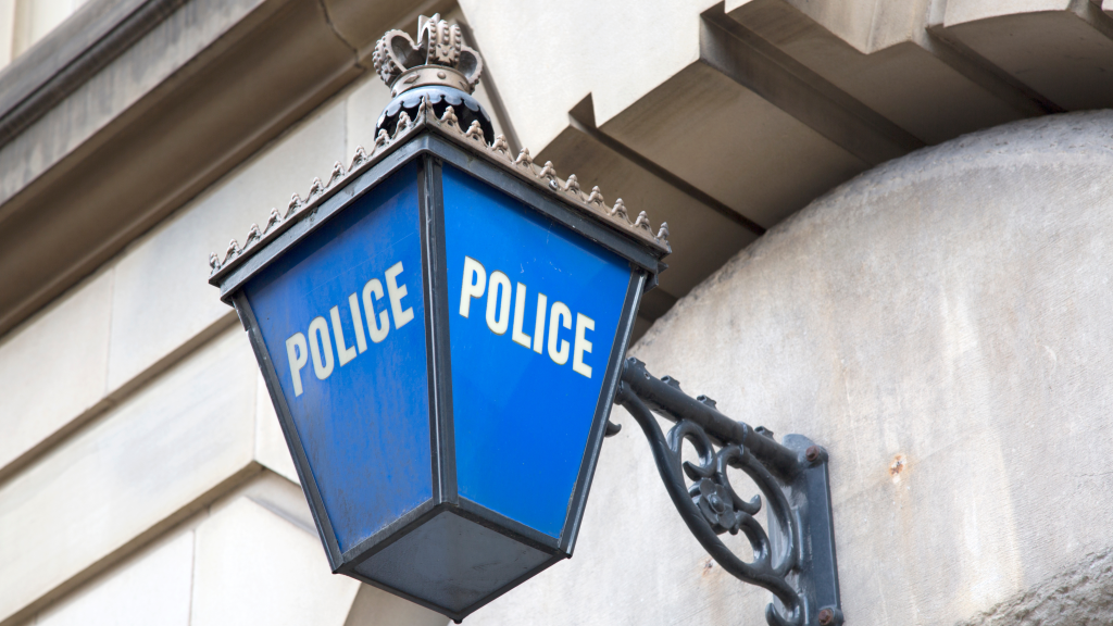 Police station sign in the UK. Photo credit: Canva Pro