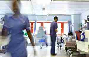 Busy NHS ward (blurred), courtesy of the Department for Health and Social Care
