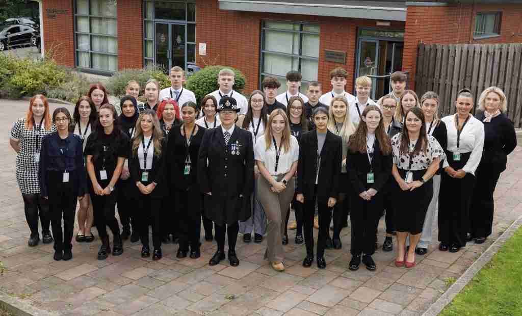 Apprentice intake group image outside Wilmott Suite at Sedately Park. Photo credit: Greater Manchester Police.