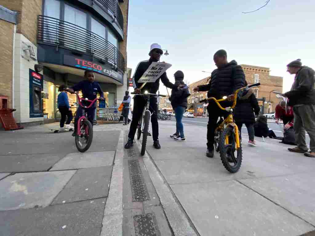Group of black youths on bikes outside Tesco Express. Image credit: Shutterstock.