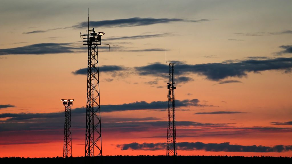 Radio masts at dusk.