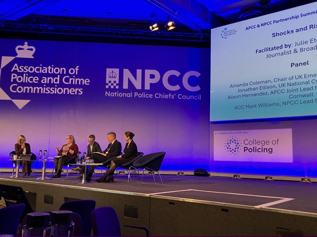 Amanda Coleman on stage (2nd left) at NPCC/APCC conference.